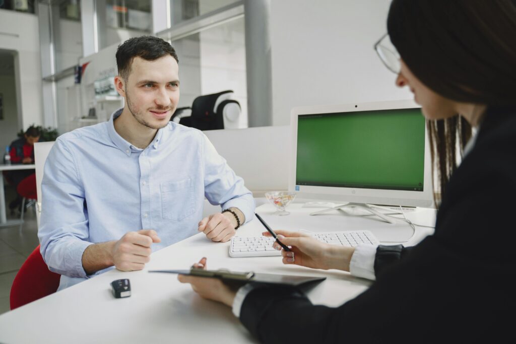 pexels-photo-4895430-4895430 A business meeting between two office professionals, discussing strategies in a modern office.
